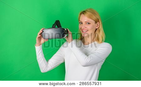 Beautiful Woman Wearing Virtual Reality Goggles In Studio. Person With Virtual Reality Helmet Isolat