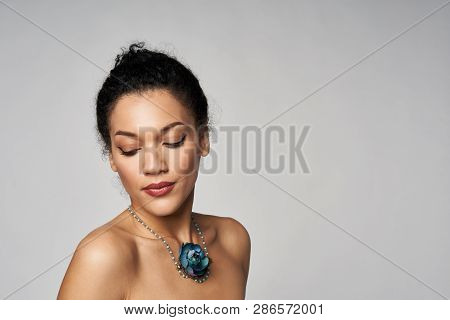 Beauty Portrait Of Beautiful Mixed Race Woman Wearing Chocker