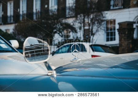 London,uk - February 23, 2019: Close Up Of A Bonnet Star Badge On Old Blue Mercedes-benz 600 Parked 