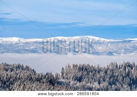 View From Pack Over Foggy Valley To Snowy Mountain Range With Mountains Peterer Riegel, St. Leonhard