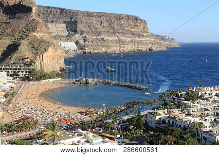 Mogan Beach In Puerto Mogan, Gran Canaria - Aerial View Of Beach And Atlantic Ocean.