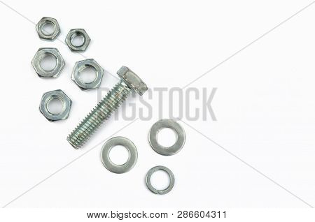 Metal Fasteners. Bolt, Nuts, Washers And Washer-grover For Construction On A White Background, Close