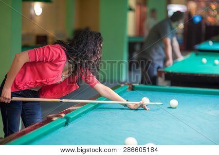 Girl Plays Billiards, Learns On A Billiard Table