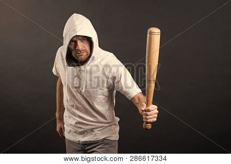 Man Hold Baseball Bat, Aggression. Hooligan Wear Hood In Hoody, Fashion. Gangster Guy Threaten With 