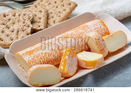 Fagotin Cheese With  Orange Coloured Rind Made From Cow Milk In Caves Of Maredsous Abbey, Belgium