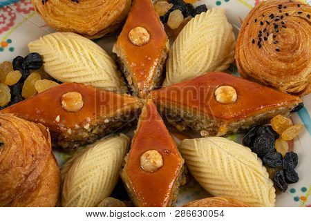 Festive Baking For The Holiday Of Navruz. Shekerbura, Baklava, Puff Pastry With Salted Filling, On A