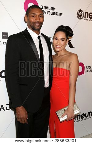 LOS ANGELES - FEB 24:  Metta World Peace, Maya Ford Artest at the Elton John Oscar Viewing Party on the West Hollywood Park on February 24, 2019 in West Hollywood, CA