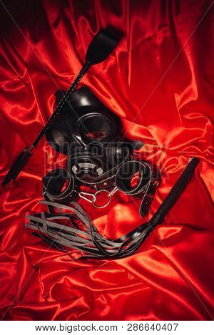 Close Up Bdsm Outfit. Bondage, Kinky Adult Sex Games, Kink And Bdsm Lifestyle Concept With Gas Mask,