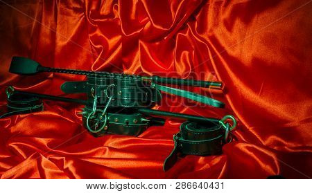 Close Up Bdsm Outfit. Bondage, Kinky Adult Sex Games, Kink And Bdsm Lifestyle Concept With A Pair Of