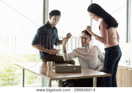 Asian Business Team With Casual Suit Working With Happy Action In Office Business People Concept.
