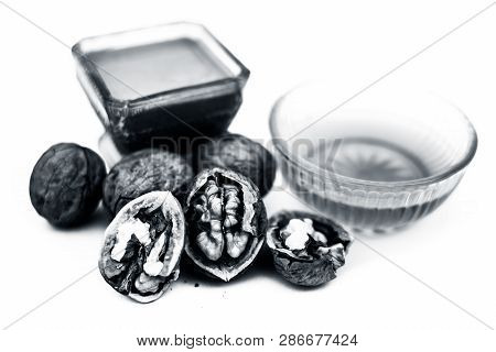Close Up Of Best Home Remedy To Treat Anemia In A Glass Bowl Isolated On White Consisting Of Walnut
