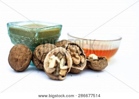 Close Up Of Best Home Remedy To Treat Anemia In A Glass Bowl Isolated On White Consisting Of Walnut