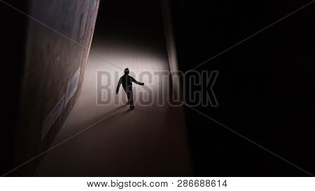 Walking Mini Figure To At Tunnel Through Bright Future