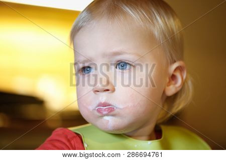 Toddler With Milk Moustache From Eating Independently, Making A Mess. Early Childhood Development, M