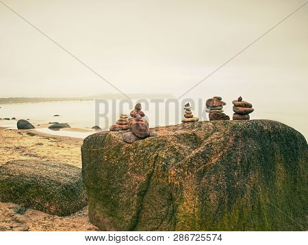 Stack Of Pebble Stone On Shingle Beach. Pile Of Stacked Stones On The Beach, Colorful Pebles Coast.