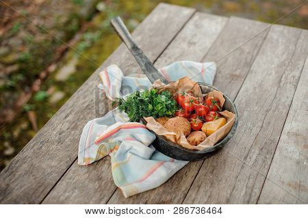 Traditional Georgian Dish Mchadi In The Pot On A Light Tablecloth