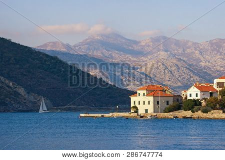 Beautiful Winter Mediterranean Landscape. Small Seaside Village At The Foot Of The Mountains. Monten