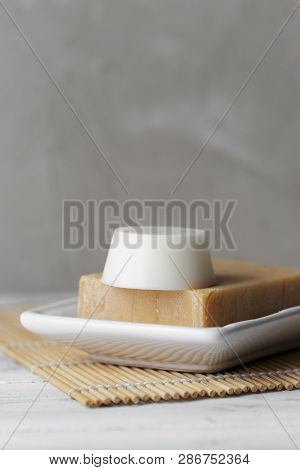 Solid Shampoo And Conditioner Bars In Soap Dish