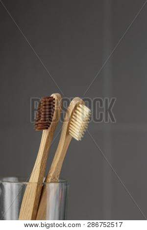Two Eco Friendly Bamboo Brushes In A Glass