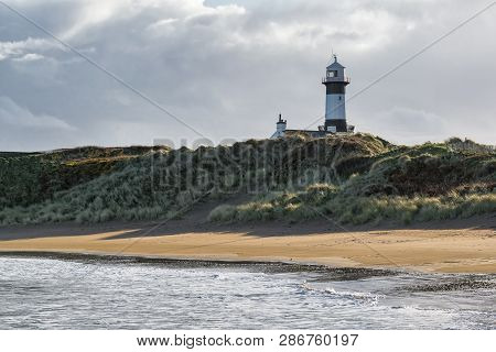 This Is A Picture Of Stroove Beach And Lighthouse On The Inishowen Penisula, Donegal Ireland