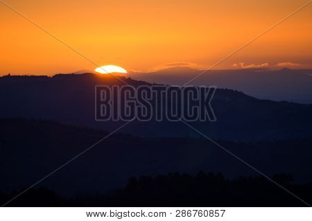 Silhouette Sunset Dawn Orange And Blue Mountain