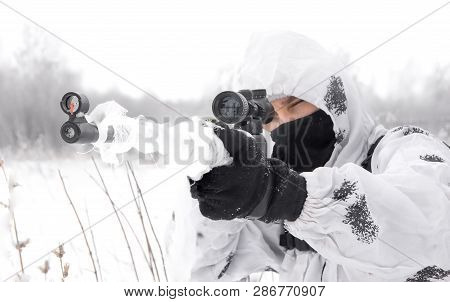 Closeup Portrait Man Soldier In The Winter On A Hunt With A Sniper Rifle In White Winter Camouflage