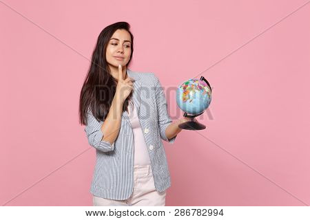 Pensive Young Woman In Striped Jacket Put Hand Prop Up On Chin, Holding Earth World Globe Isolated O