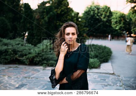 Beautiful Young Girl In The Park On A Summer Evening.