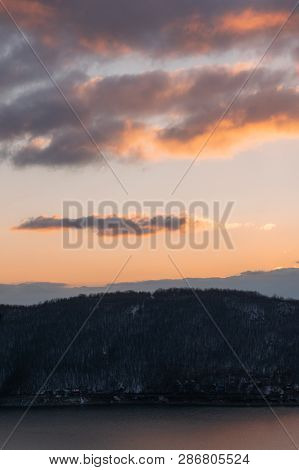 A Shot Of A Dramatic And Colorful Sunset On Bovan Lake On Cold, Dry Winter Day