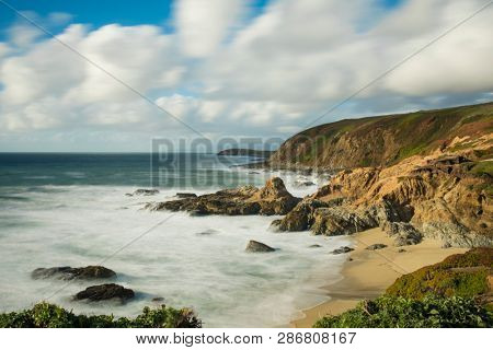 Extemely long exposure of waves crashing on the California coast at Bodega Bay near San Francisco.