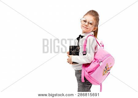 Back To School. Beautiful Little Girl Dressed Like A School Girl - White Shirt And Gray Pants, Round