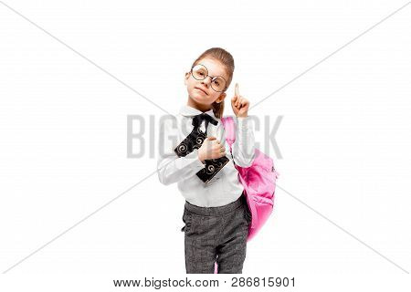 Back To School. Beautiful Little Girl Dressed Like A School Girl - In White Shirt And Gray Pants, Ro