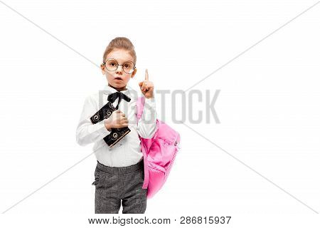 Back To School. Beautiful Little Girl Dressed Like A School Girl - In White Shirt And Gray Pants, Ro