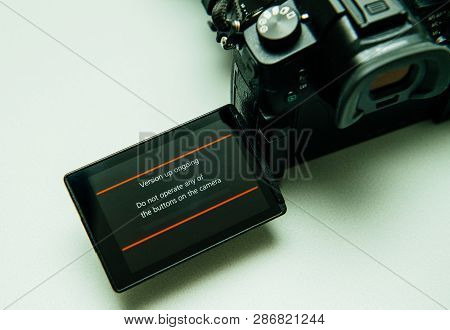 Paris, France Sep 30, 2017: Firmware Update Process On The Screen On Modern Panasonic Lumix Gh5 Mess