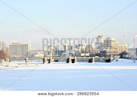 St. Petersburg, Russia - January 21, 2016: Winter View Of The Grand Central Bridge And Frozen River 