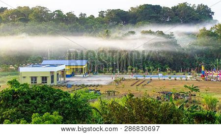 Labuan,malaysia-feb 28,2019:beautiful Landscape With Mountain View And Morning Fog In Bukit Kalam Vi