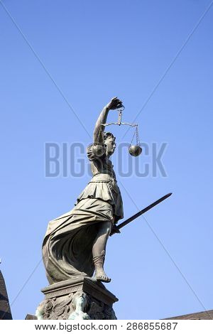 Statue Of Lady Justice In Front Of The Romer In Frankfurt - Germany