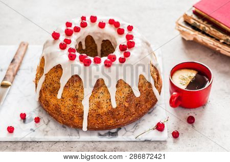 Lemon Poppy Seed Bundt Cake With Sugar Glaze And Redcurrant