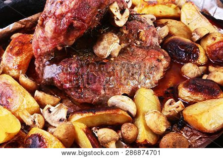 Grilled Pork Meat With Potatoes. Barbecue. Selective Focus.