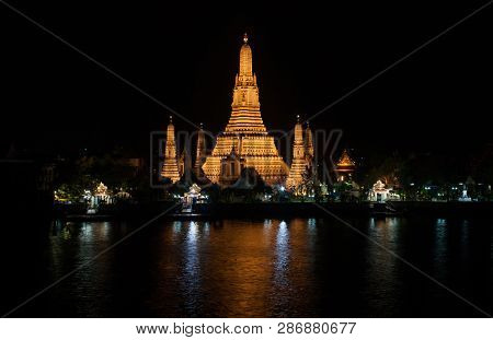 Wat Arun Historical Park And The Chao Phraya River At Night