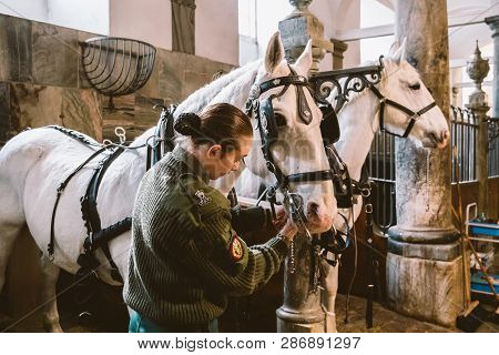 February 20, 2019.royal Stable In Denmark Copenhagen In Territory Christiansborg Slot. Man Young Wom