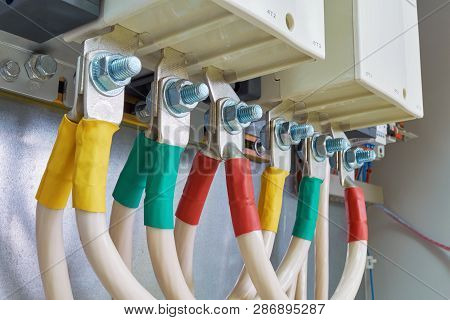 Large Power Cables Or Wires Are Connected From Below To Powerful Magnetic Starters. Cables Are Marke