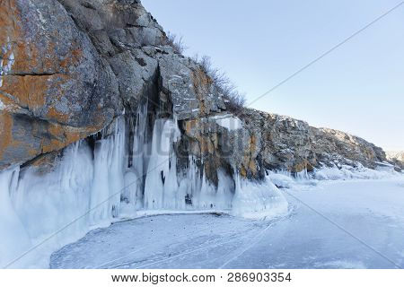 Large Icicles. Winter Frozen Nature