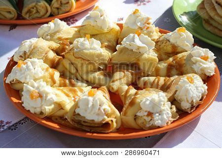 Hin Rouge Pancakes On Milk With Butter Cream, Wrapped In An Envelope And Topped With Jam. Pancakes A