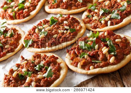 Lebanese Meat Pie Recipe Sfeeha With Ground Meat, Onions, Tomato, And Pine Nuts Closeup. Horizontal