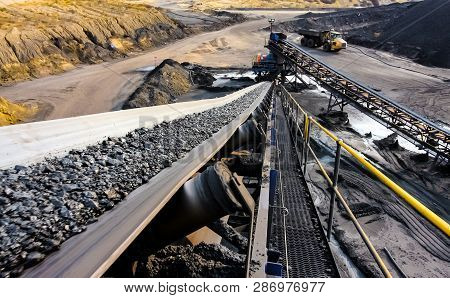 Coal Ore On A Conveyor Belt For Processing