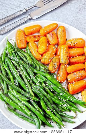 Healthy Food On A Plate. Green String Beans And Baby Carrots, Cooked On The Grill. Vegan Lunch. Usef