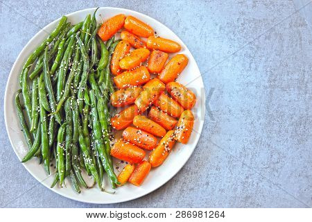 Healthy Food On A Plate. Green String Beans And Baby Carrots, Cooked On The Grill. Vegan Lunch. Usef