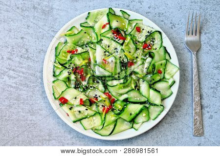 Cucumber Salad In Chinese Style. Salad With Cucumbers And Chili Pepper. Chinese Salad With Cucumber.