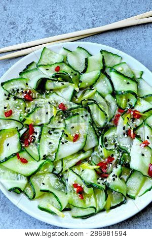 Cucumber Salad In Chinese Style. Salad With Cucumbers And Chili Pepper. Chinese Salad With Cucumber.